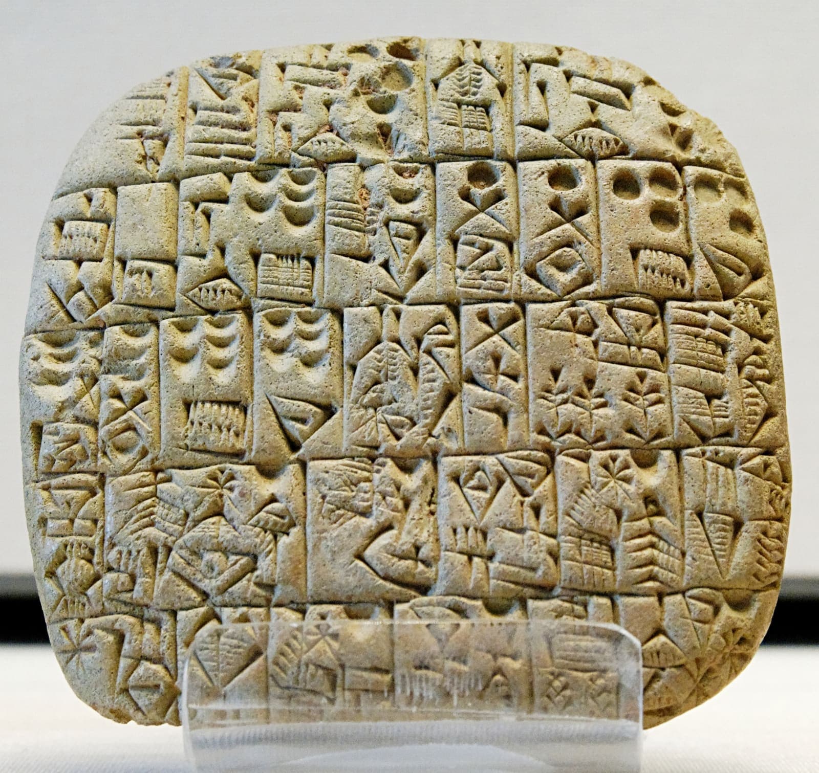 A Sumerian clay tablet recording the sale of a field and house